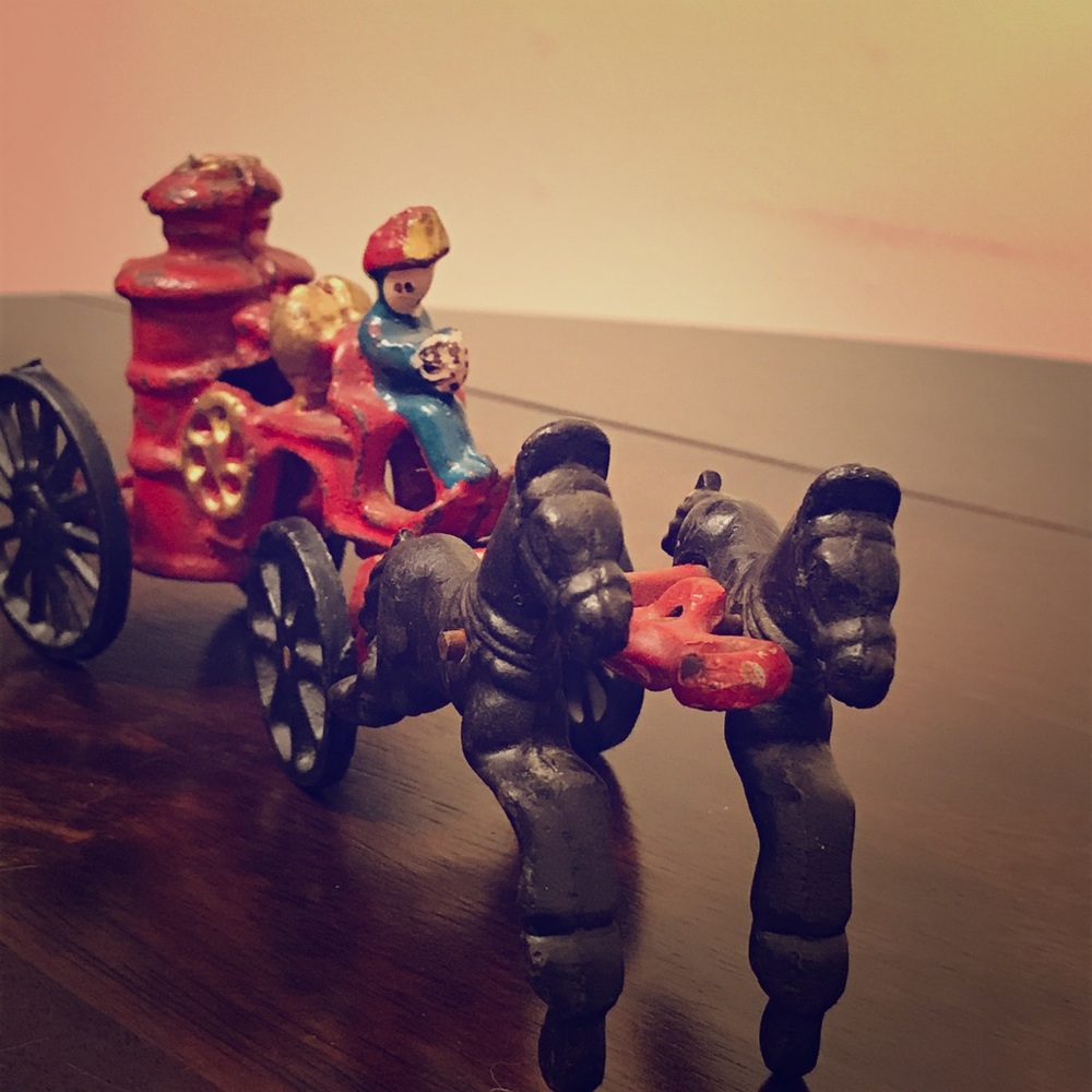 Cast iron horse drawn fire wagon